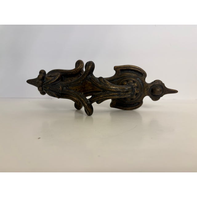 This victorian style cast iron door knocker can be used as such and as a door handle. It stands at 10" long by 4" wide and...