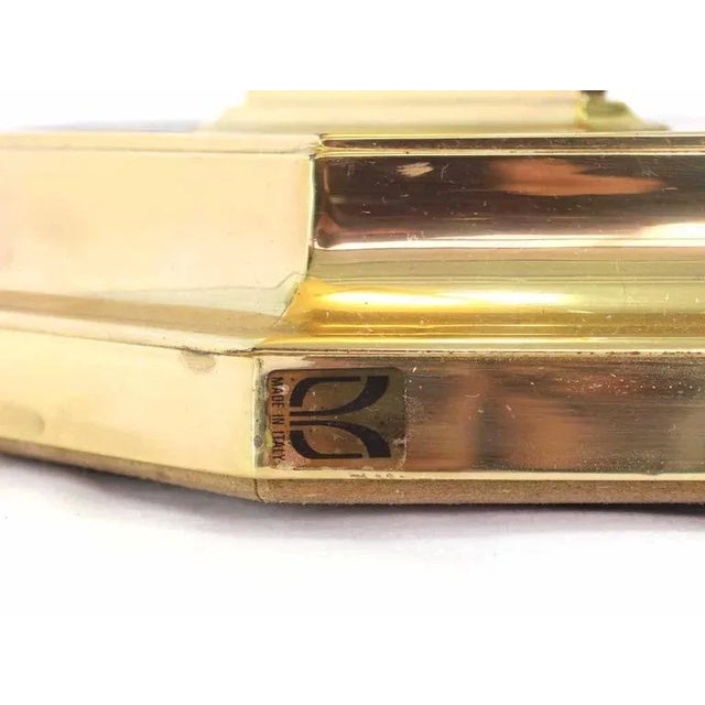 Very nice rectangle figural brass base coffee table with glass top.