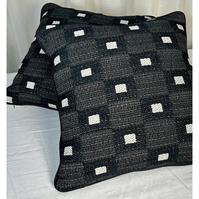 A pair of unique decorative sofa pillows covered front & back with Tibor’s modern wool blended geometric inspired from the...