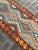 Hand-Woven Afghan Kilim Runner • Features a unique geometric pattern with vibrant colors. • Made from durable wool for a...