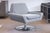 A DellaRobbia "Tech" chair and ottoman. This lovely lounge set features a fully featured swivel lounge chair and matching...
