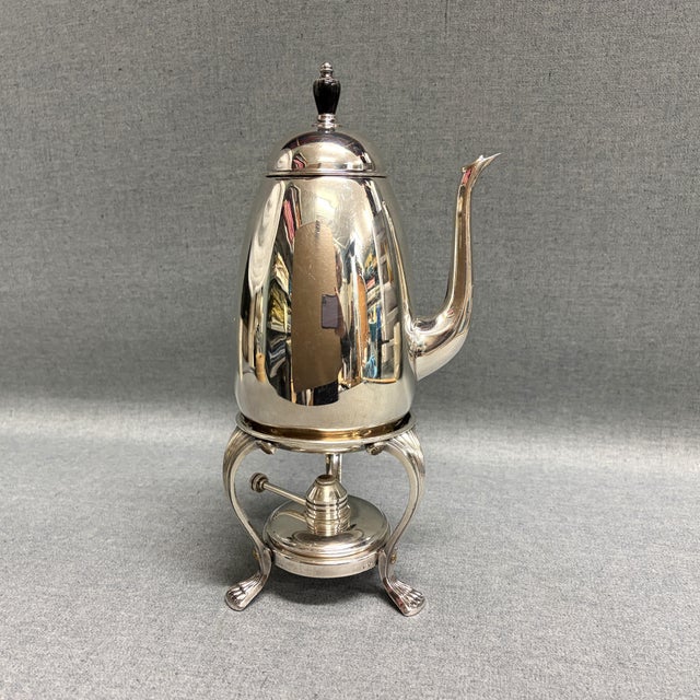 A striking F.B. Rogers coffee server with a warming stand. The silver plated coffee pot would make an excellent addition...