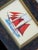 Hand-painted by master artists using acrylic paints and natural pigments, this sailing ship painting pairs vivid red and...