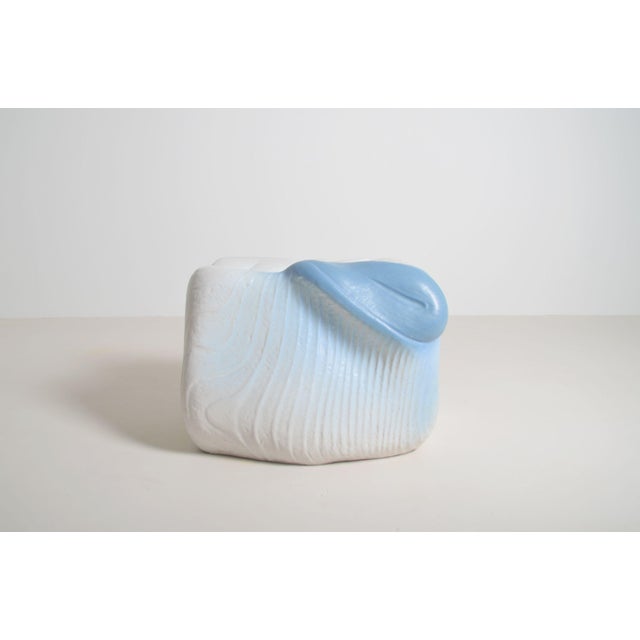 Organically shaped ceramic artwork. It features sea motifs, including a whale and a mussel. The artwork is heavy (28 kg)...