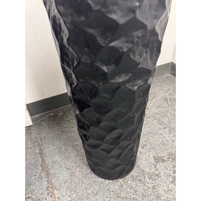 Design Plus Gallery presents a Pair of Vintage Hammered Planters. This matching pair have a tall, tapered silhouette with...