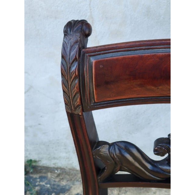 This 19th century mahogany Duncan Phyfe desk chair is a stunning piece of antique furniture perfect for any indoor space....