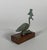 Bronze statuette of Thoth-Ibis with a green patina, Egypt, Ptolemaic period, 332–30 BC. This bronze statuette depicts a...