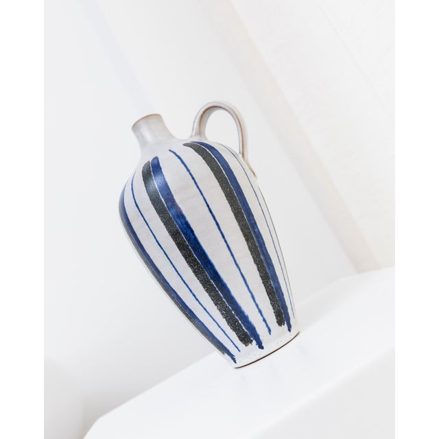Shapely vintage vase by Friedel for PGH Bürgel. The straight-lined vase with painted glaze fits perfectly into the mid-...