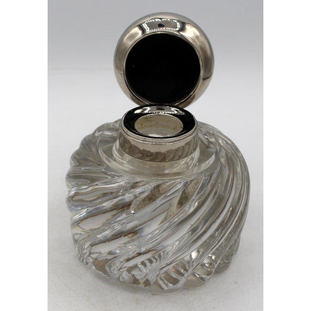 Large Baccarat gentleman's desk inkwell, circa 1890-1900. Swirled glass with silverplated cover and collar, known as The...
