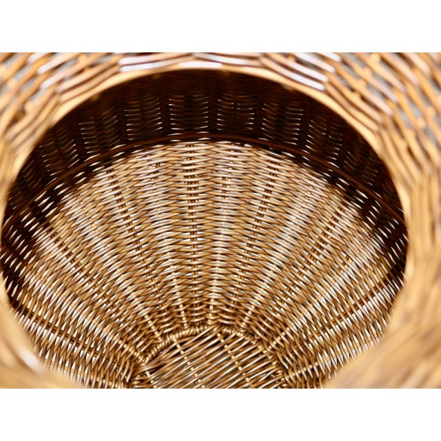 Resin Wicker Woven Urns - A Pair. This pair of woven resin reeds in the color of natural wicker reeds will enhance your...