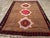 This piece features a wool pile of symmetric knots on a wool foundation. Three bold ecru octagrams march up the center of...