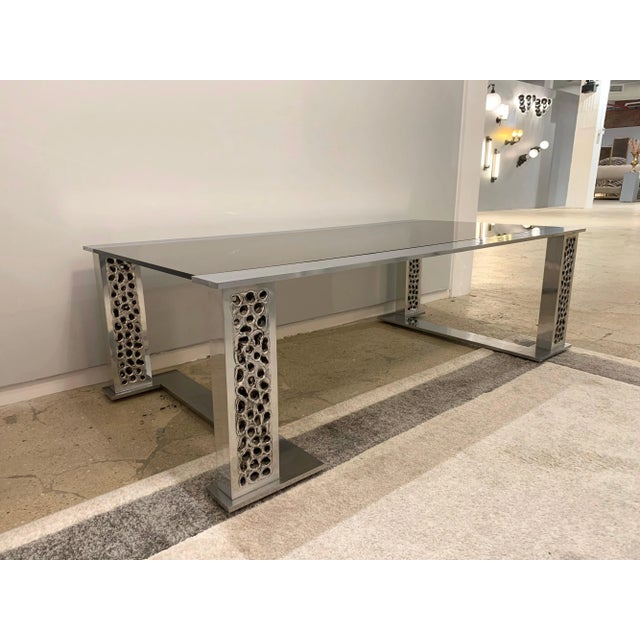 A rare original 1970s handmade burnt and hammered aluminum and smoked glass table by Belgian goldsmith, Willy Luyckx for...