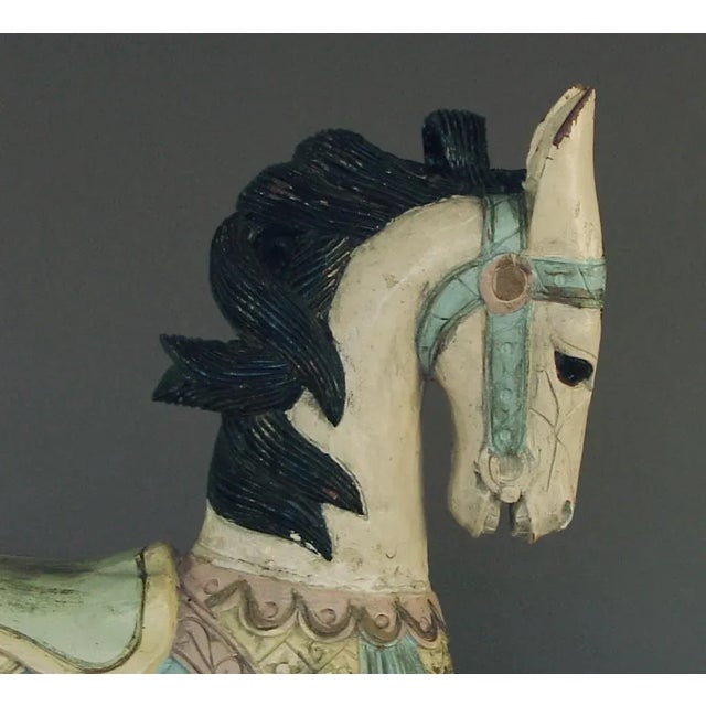 Wow, does this guy have the "right stuff" or what?! Fabulously carved mane and tail (as well as the rest), terrific...