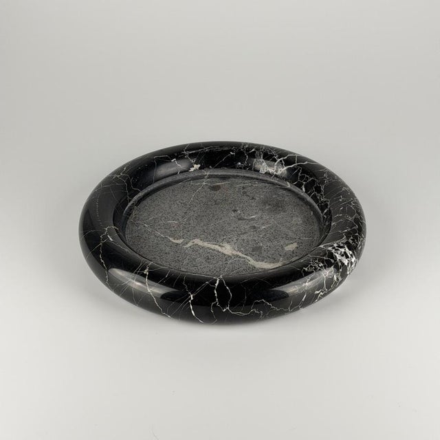 Monumental in presence and minimal in gesture, this large marble centerpiece embodies the sculptural rigor and material...