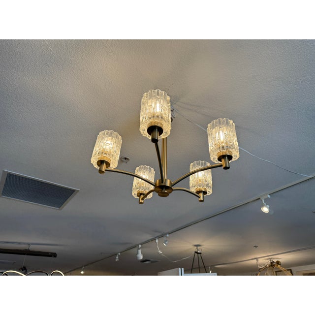 Design Plus Gallery presents the Icelight Chandelier from Possini Euro. This Icelight Chandelier collection features a...