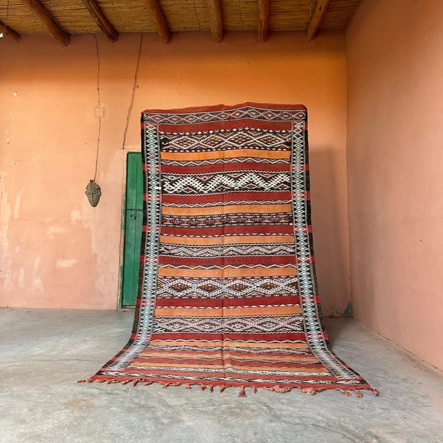 This vintage Moroccan rug is a true powerful women's artistic creation that is the first thing our eyes get caught when we...