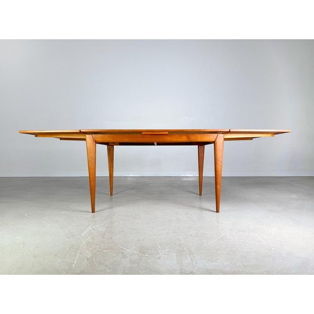 Beautiful original dining table by J.L. Moller's furniture factory from the 1960s is for sale. The table, which can be...