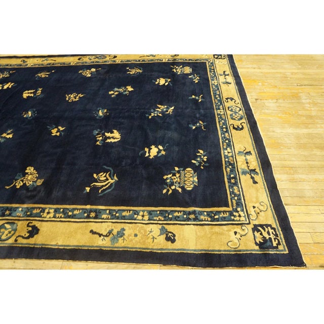 Antique Peking Chinese Floral Beige, Blue Navy 1930s Rug, Circa Date: 1930s. This exceptional Chinese Peking carpet...
