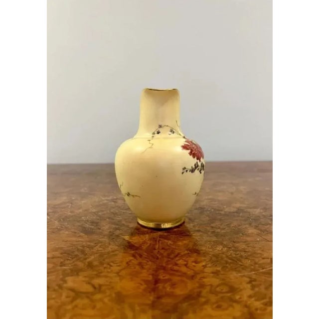 Quality antique Royal Worcester jug having a quality hand painted and gilded handle to the back of the jug decorated with...