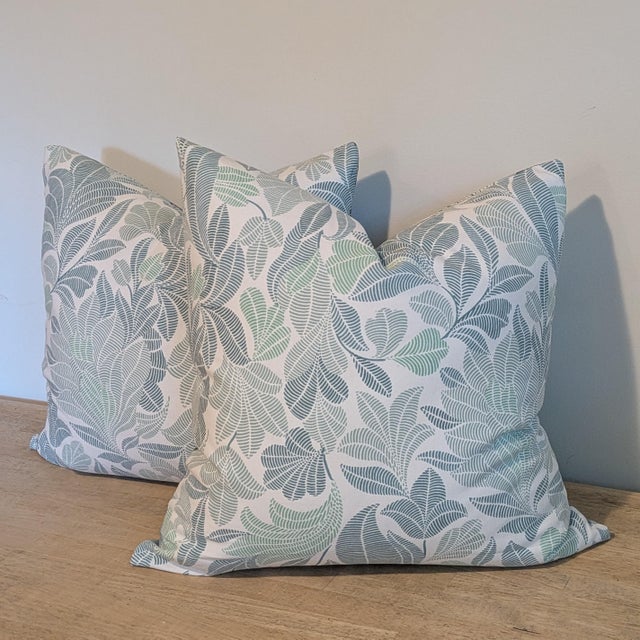 Schumacher Peacock print pillows in aqua colorway featuring shades of blues, teals and neutrals. Fun mix and match backs...