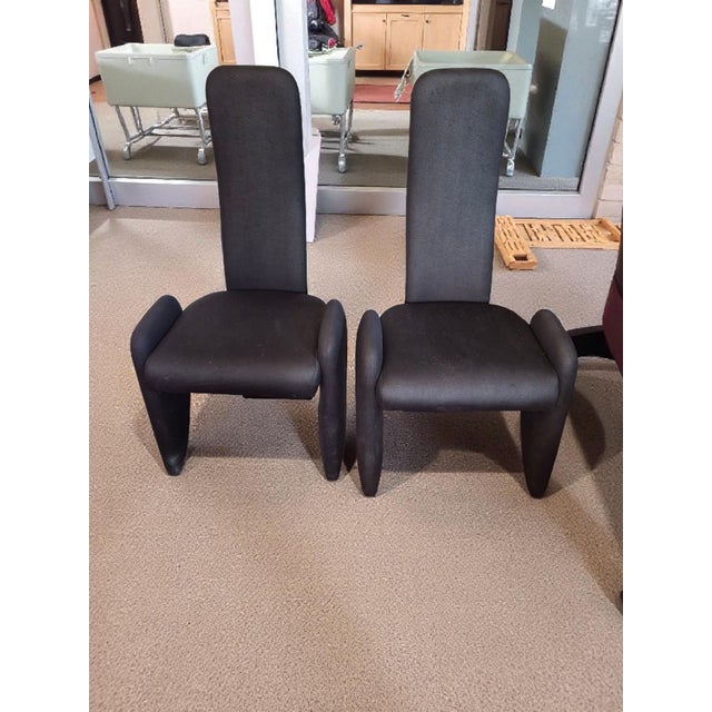 The Vintage Mid-Century Modern Pair attributed Pierre Cardin styled Black Chairs are a stunning addition to any room....