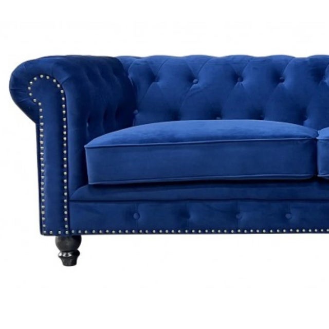 Chester premium 3-seater sofa, navy blue velvet upholstery -design sofa, 3 seats. -made with a solid wooden structure....