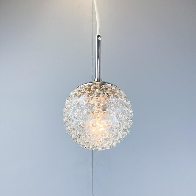 A cool space-age design classic, made in germany, shown here in the smaller version with a 15cm diameter sphere. The...