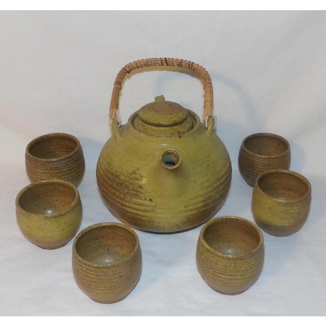 This is a Gorgeous! Handmade Mid 20th Century 8pc Tea Set that includes a Teapot with Lid and Six Tea Cups. They are a...