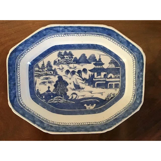 Antique 19th c. Canton platter decorated in bright blue & white with a harbor landscape scene. Octagonal shape with nice...
