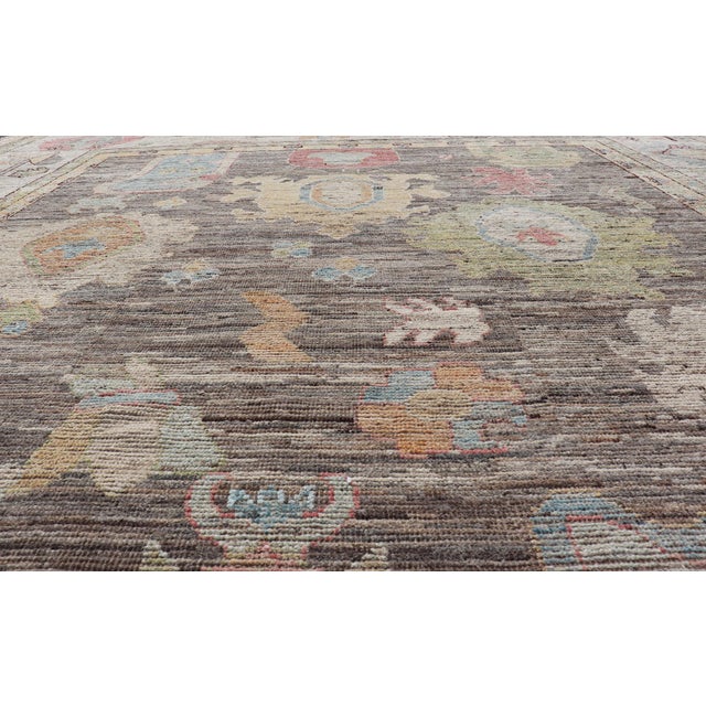 Cream Large Floral Designed Modern Oushak on a Brown-Gray Field and Cream Border For Sale - Image 8 of 12