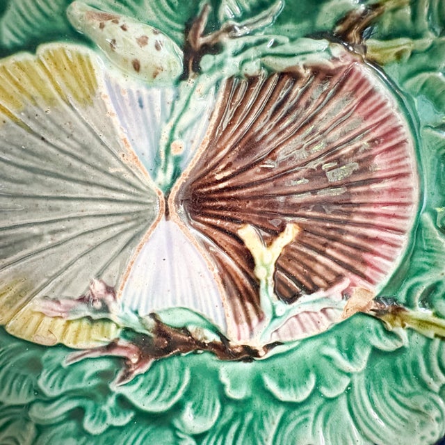 This beautiful and rare 19th century Wedgwood scallop shell platter is a collector's item through and through. Features...