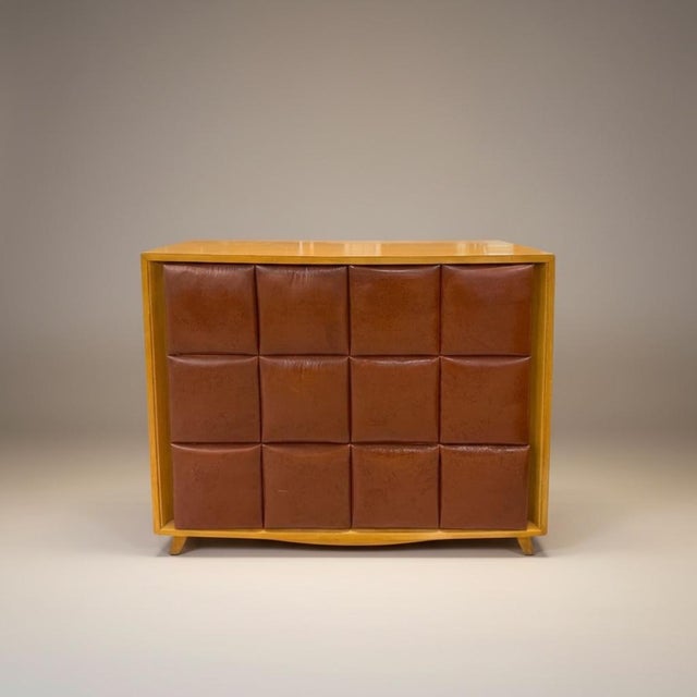 A rare find! This is an original upholstered walnut chest by Gilbert Rohde for Herman Miller. It is the design piece model...