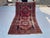 Faded Red Caucasian Rug – Distressed Vintage Medallion Wool Rug For Sale - Image 9 of 11