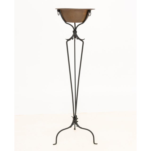 Arts and Crafts Style Copper Brazier on Wrought Iron Tripod Stand. Overall: 50" H x 18" Diameter. Provenance: A Sutton...