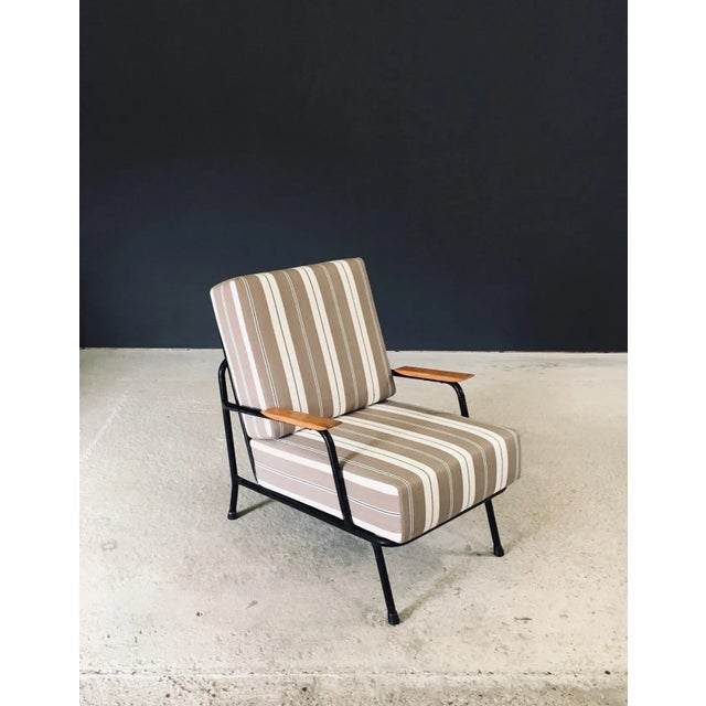 Vintage Midcentury Modern Design Lounge Chair in the manner of Pierre Guariche. Made in France, 1950's period. Black...