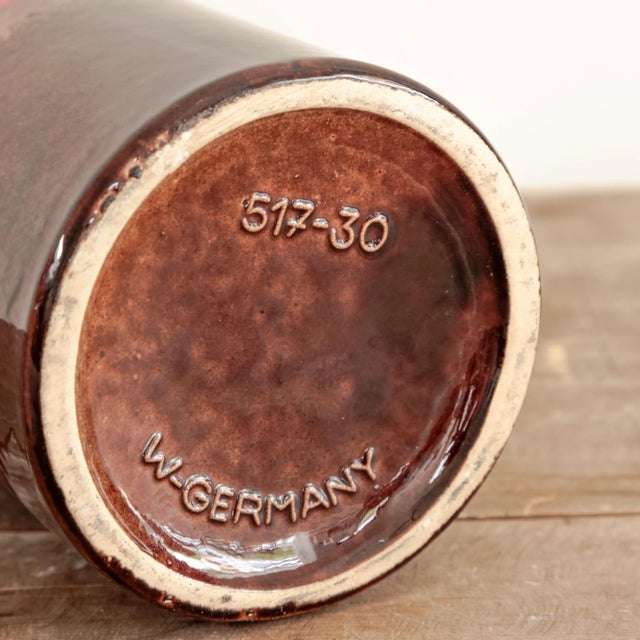 Ceramic vase 517-30 with flared lip top and orange and brown glazing, West Germany circa 1970's.