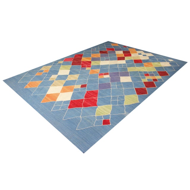 A beautiful hand knotted modern kilim made of 75% wool & 25% cotton, dyed with all natural dyes made from vegetable...