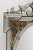 Large Venetian Renaissance-style mirror with a rectangular frame arranged around a central oval beveled mirror, measuring...