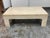 Design Plus Gallery presents a Vintage Italian Travertine Coffee Table. Its rectangular top rests on four integrated legs...