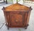 Antique Petite English Inlaid Walnut Corner Cabinet. This is an antique walnut corner cabinet featuring rich burl wood...