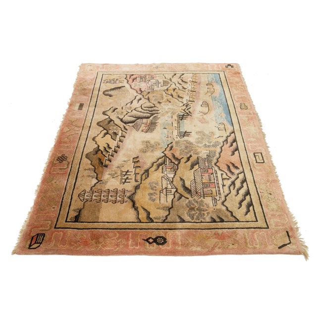 This beautiful antique Art Deco hand-knotted wool rug has a beige color field. The Chinese rug features a stunning...