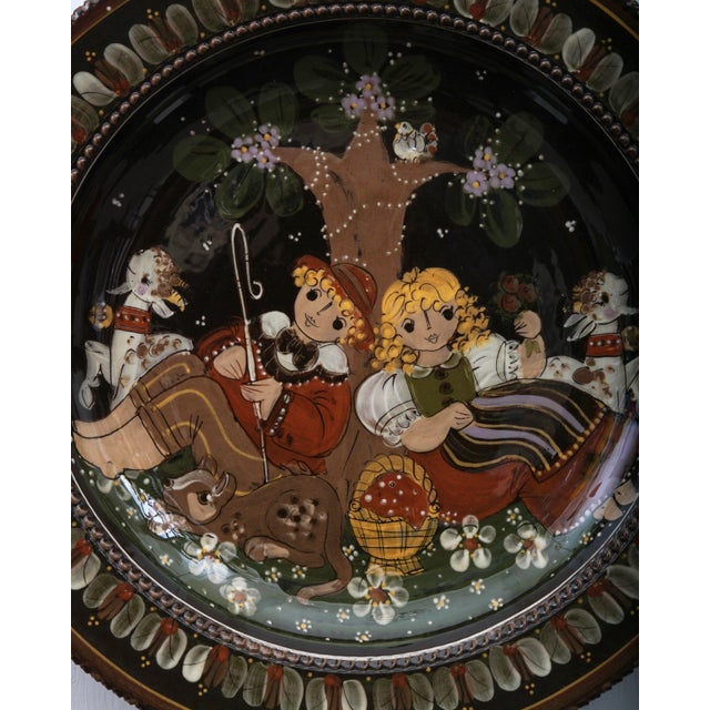 Swiss ceramic wall plate from the mid-20th century by Rudolf Heimberg. Handmade at the Kohler Biel Pottery factory in...