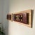 A sculptural wall art composition composed of two early 20th-century Chinese giltwood openwork floral carvings, each...