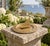 A beautiful vintage cast iron nautical garden sundial with a boat, reading "Tempus Fugit," which translated from Latin...