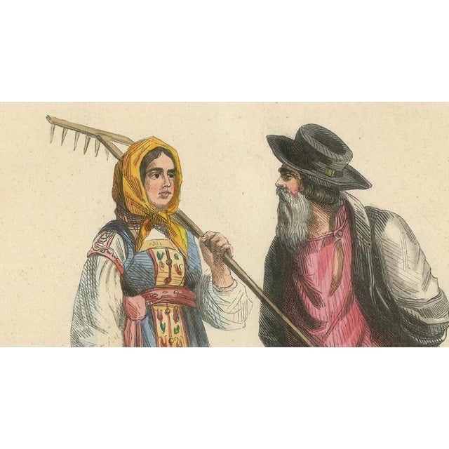 This engaging lithograph shows a Russian peasant family from the Tver region, including a man, woman, and child. The...