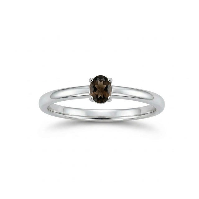 This elegant solitaire piece showcases a warm, earthy-toned gemstone set in a sleek and minimalist design, offering...