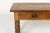A late 19th century french walnut ‘drapière’ work table. the table top is constructed with a distinctive mitred frame...