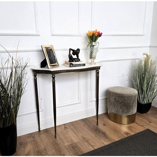 Very elegant and refined Italian 1950s Mid-Century Modern in baroque neoclassical design wall console table. The beautiful...