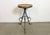 Vintage Industrial factory stool made in former Czechoslovakia during the 1960s It features a wooden seat and a grey iron...