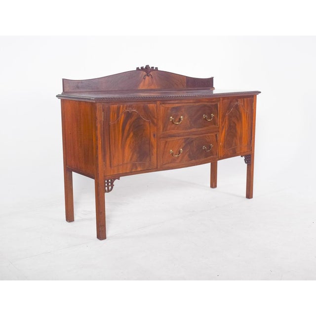 Sideboard with a small elevation. This elegant wooden sideboard has a classic and sober design, characterised by the...